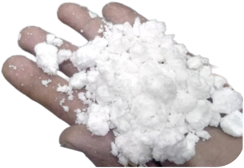 A handful of white Aminomatrix granulate